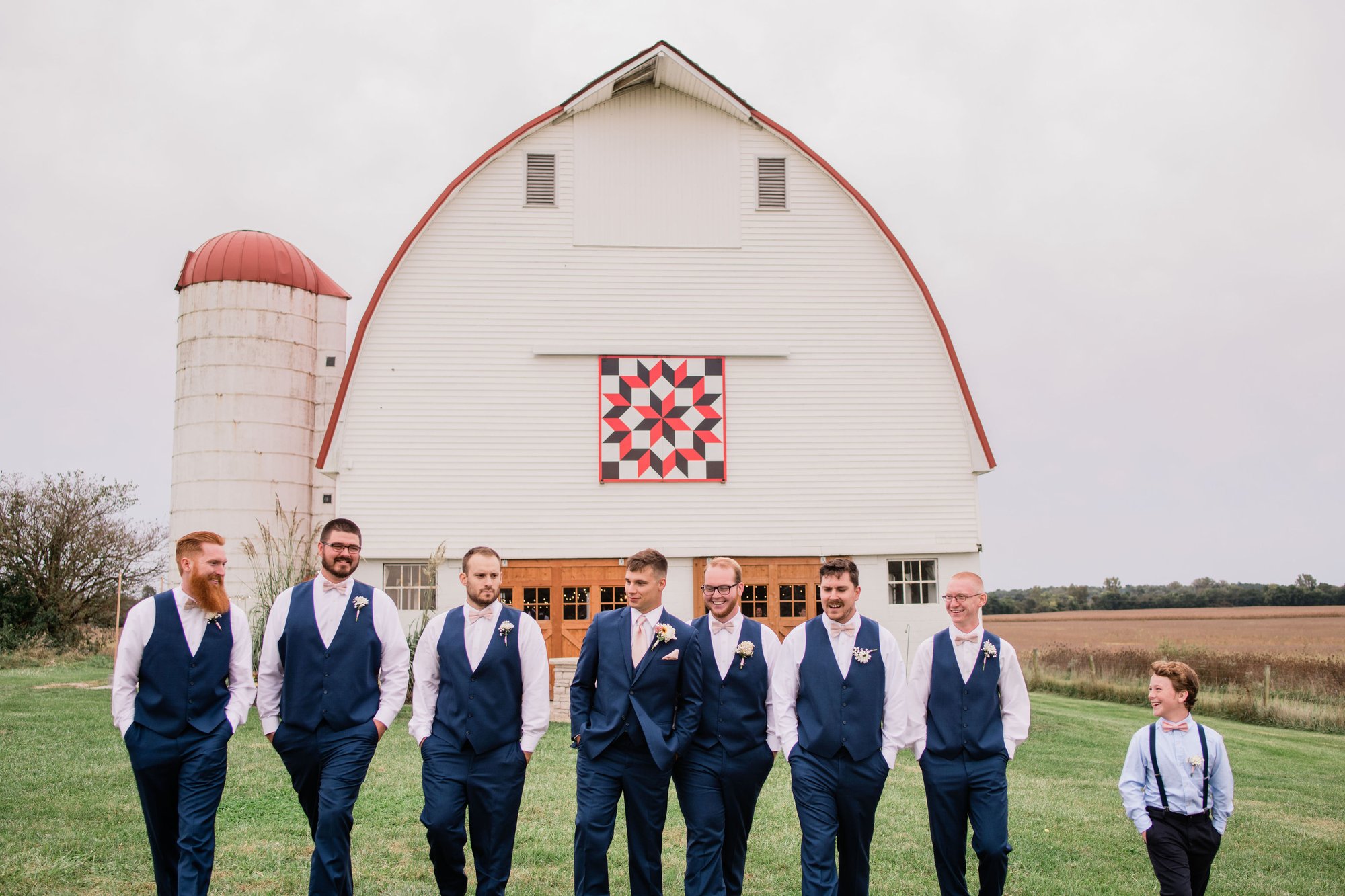 Groomsmen lined up outside the barn before the ceremony.