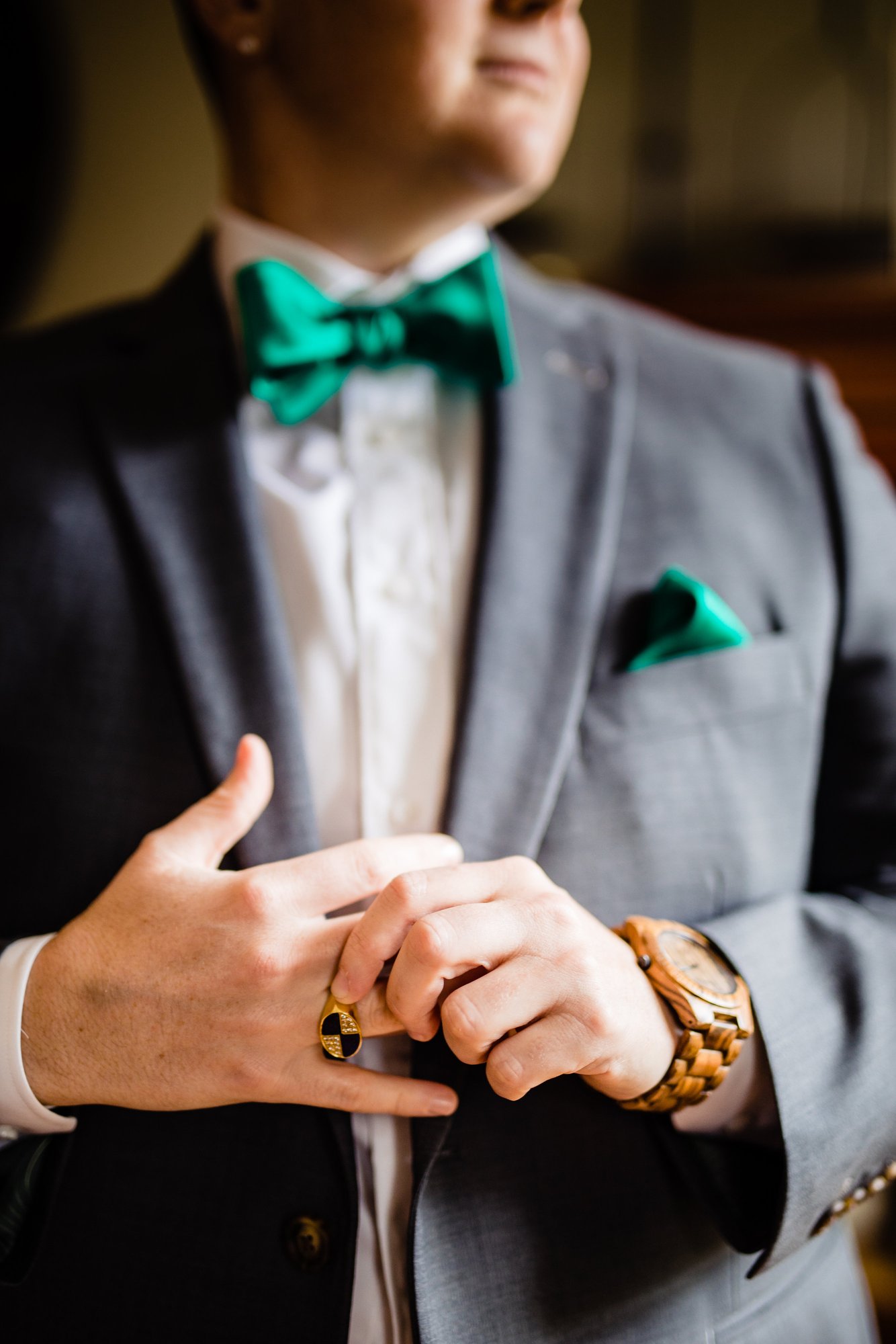 A bow tie and boutonniere laid out before the ceremony.