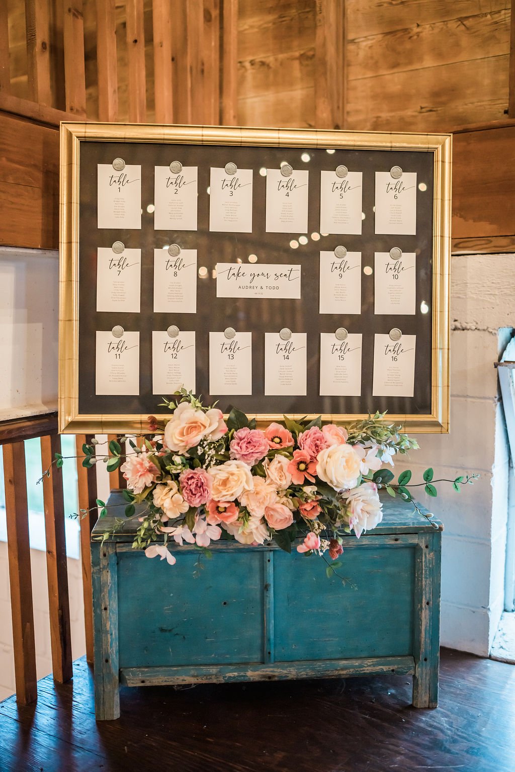 A seating chart displayed at the barn entrance.